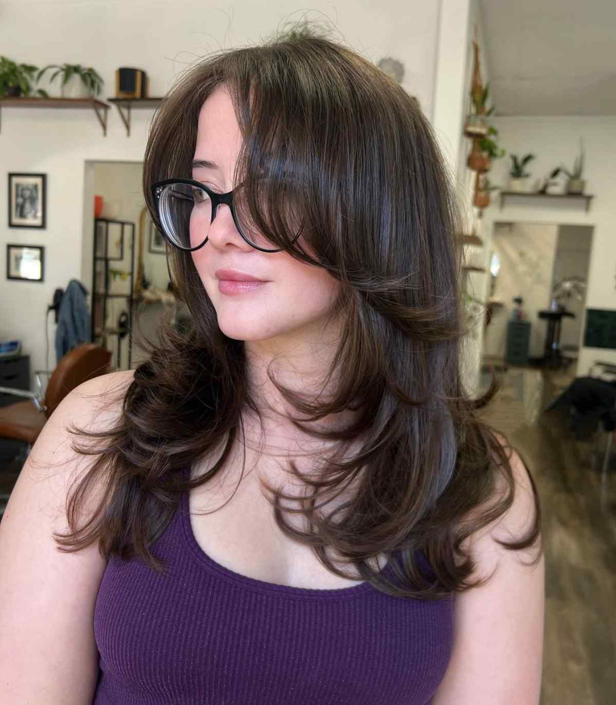 Black medium-length hair ideal for glasses and bangs