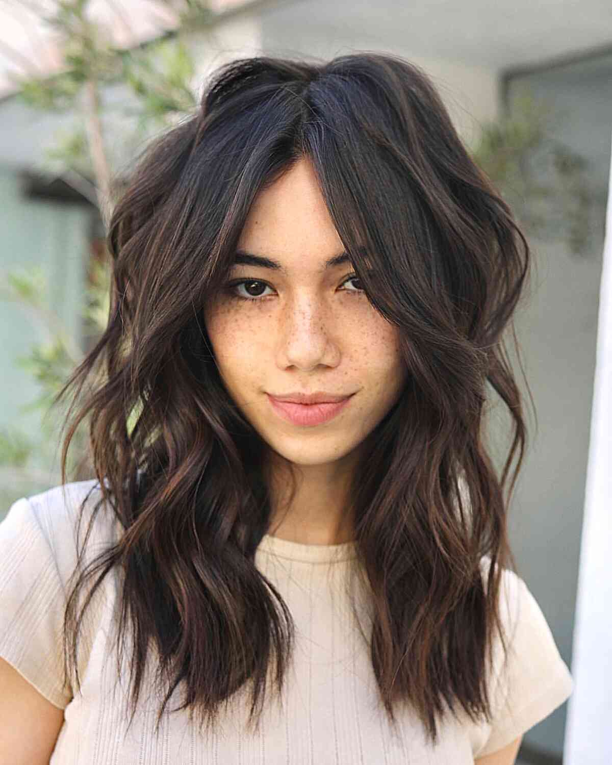 Medium Internal Layers and Face-Framing Extended Bangs for women with thin hair