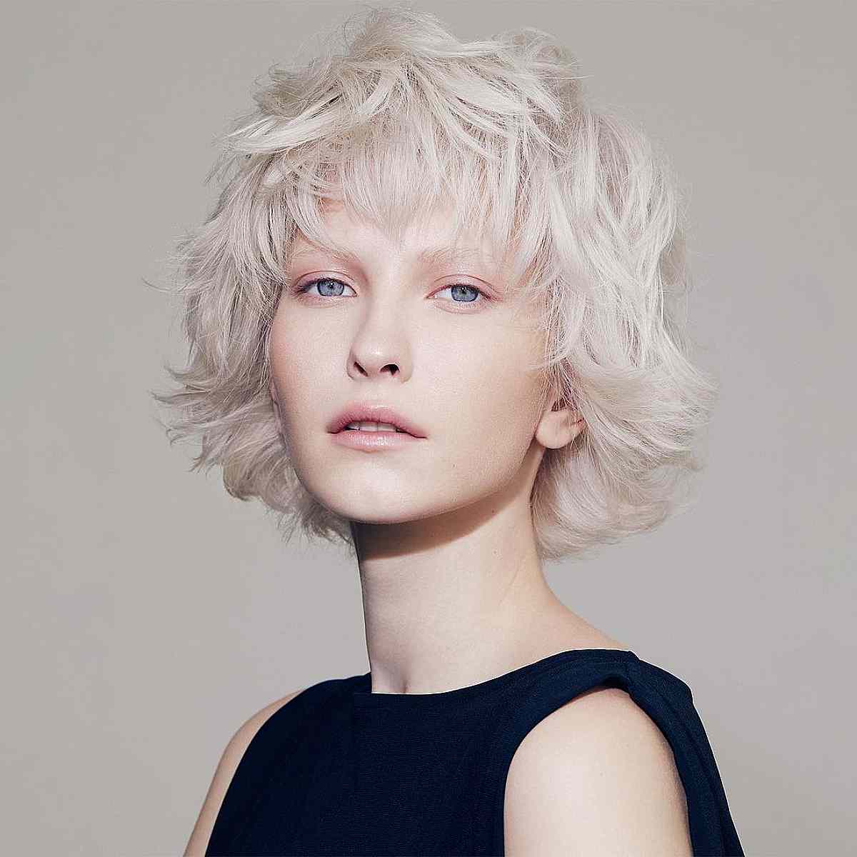 Jaw-Length Multi-Layered Shaggy Bob for Square Faced Women
