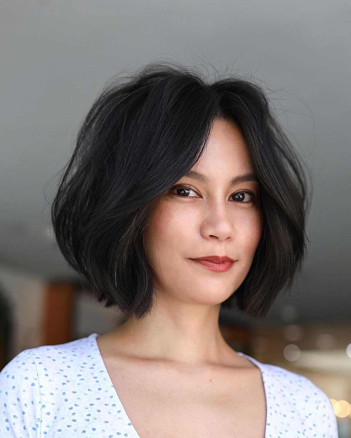Stylish Jet Black Blunt Cut Bob with a Middle Part