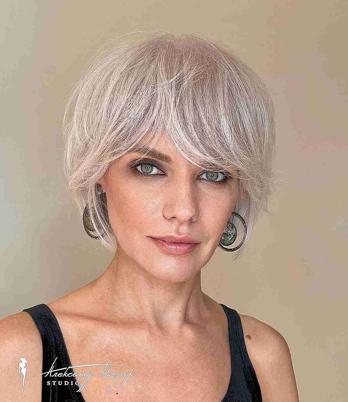 Jaw-Length Layered Bob and Bangs for Women Over 40