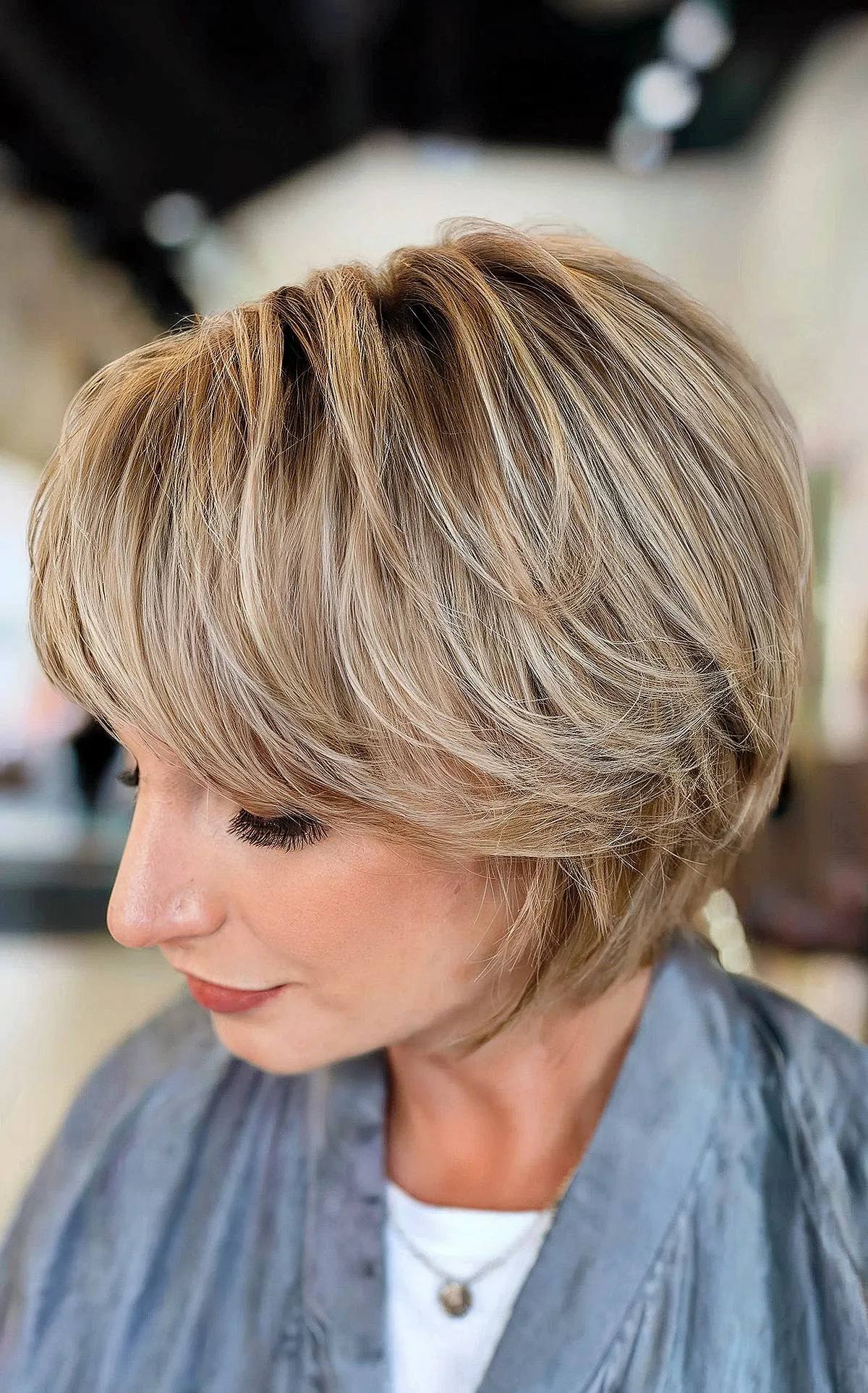 Stylish layered bob featuring angled bangs