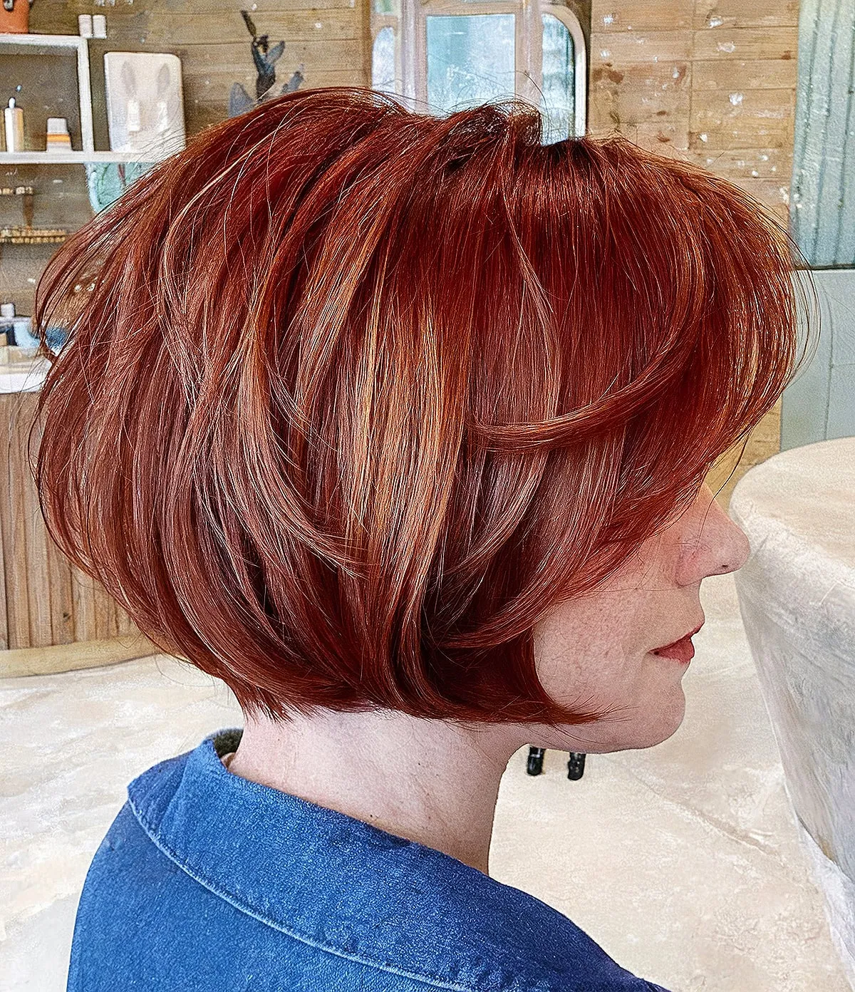 Layered Stacked Bob Featuring Warm Auburn Shades