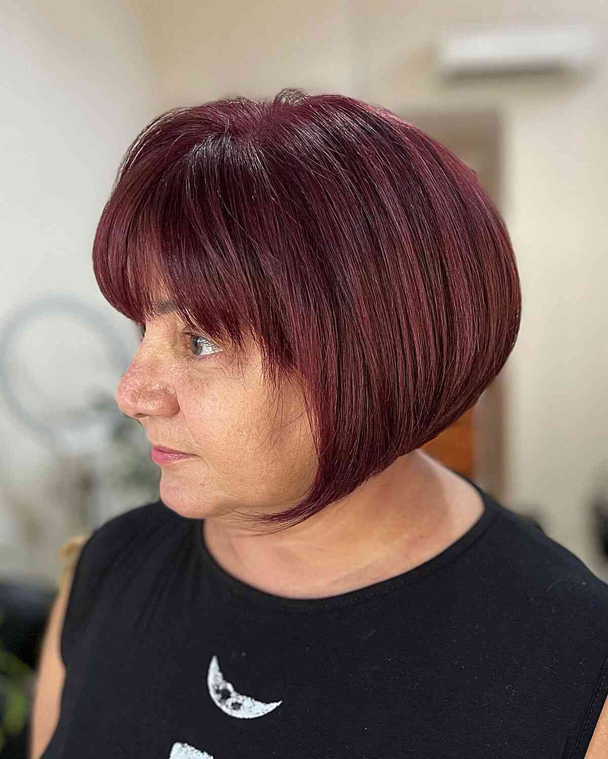 Short Layered Burgundy Bob with Fringes for 40-year-olds