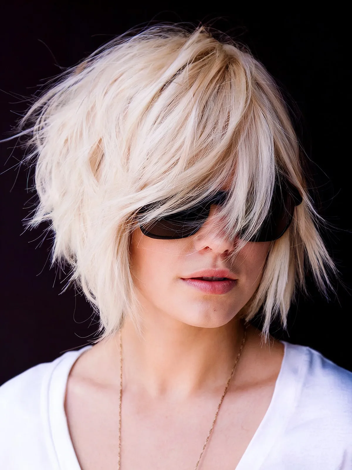 Chin-Length Bob with Layers and Swoop Bangs