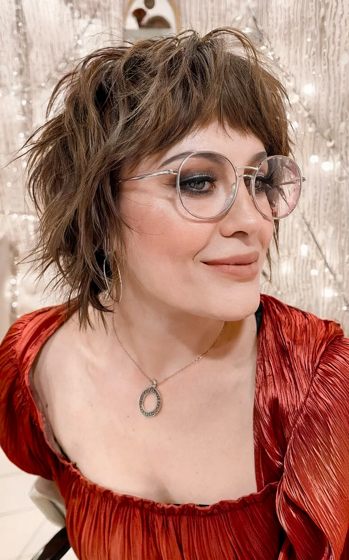 Chin-Length Layered Bob with Subtle Bangs on Textured Hair