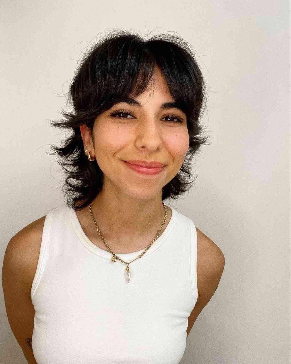 Stylish feathered shag haircut featuring curtain bangs and textured layers