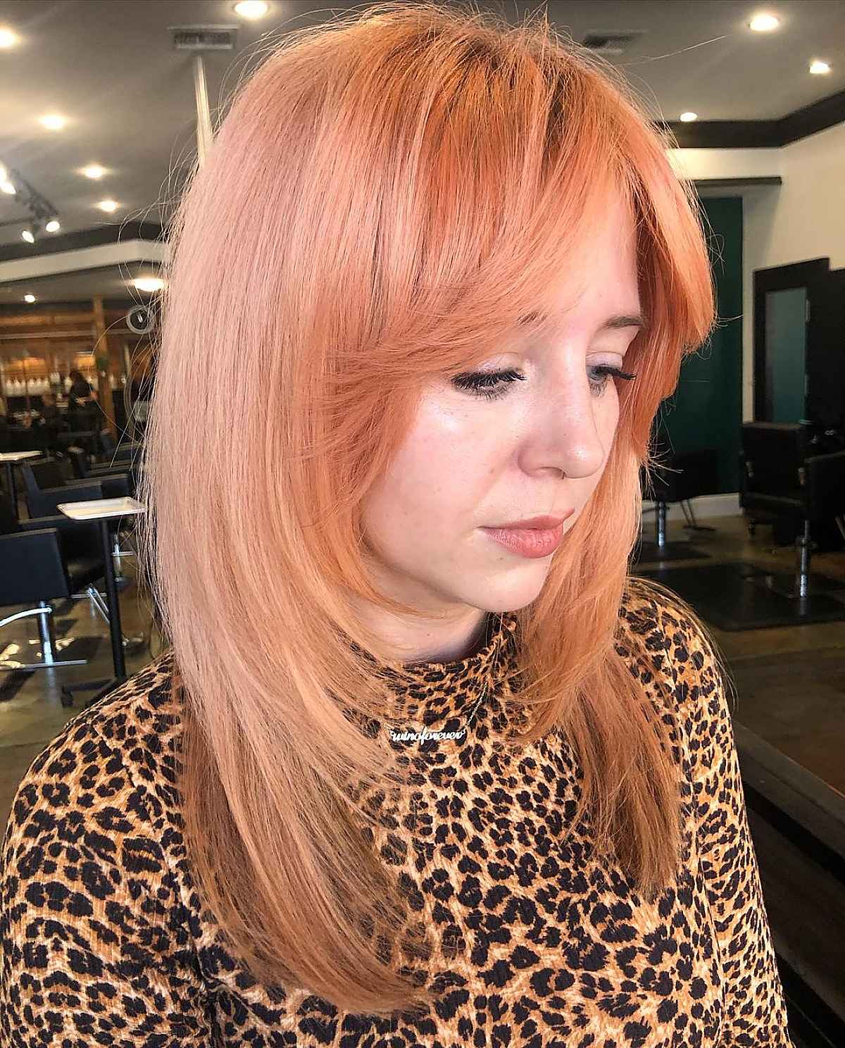 Medium-Length Layered Hairstyle with Framing for the Face