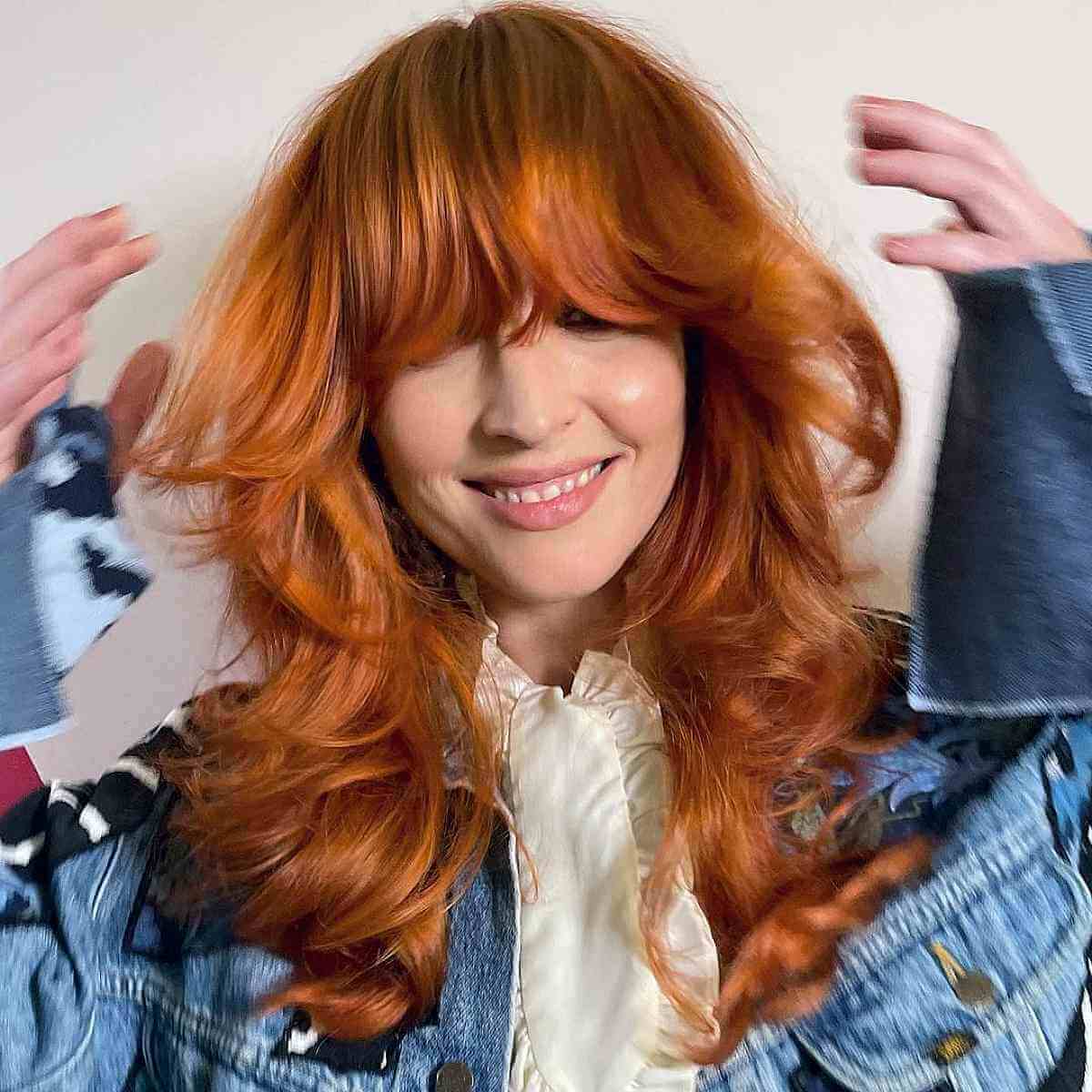 Layered Hairstyle with Straight Bangs