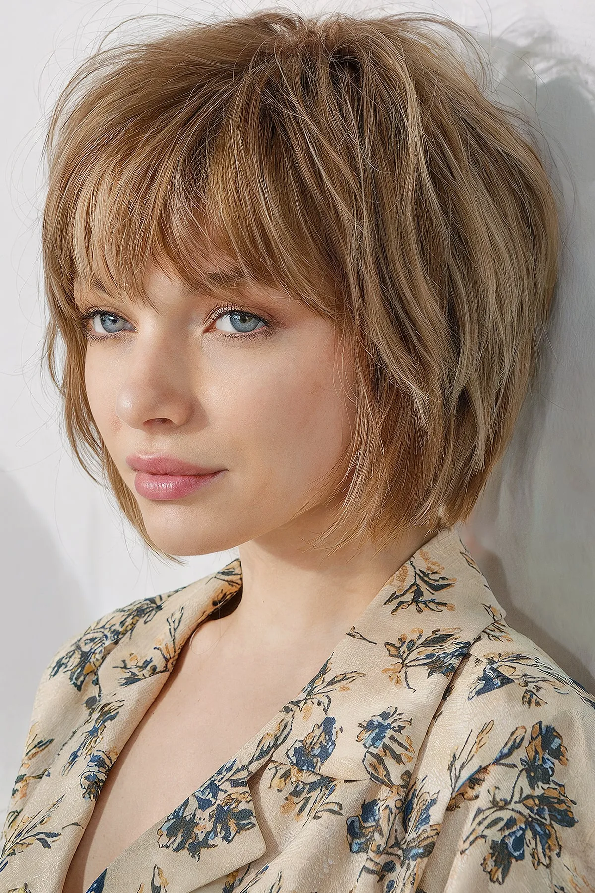 Stylish Short Messy and Tousled Bob with Layers and Bangs