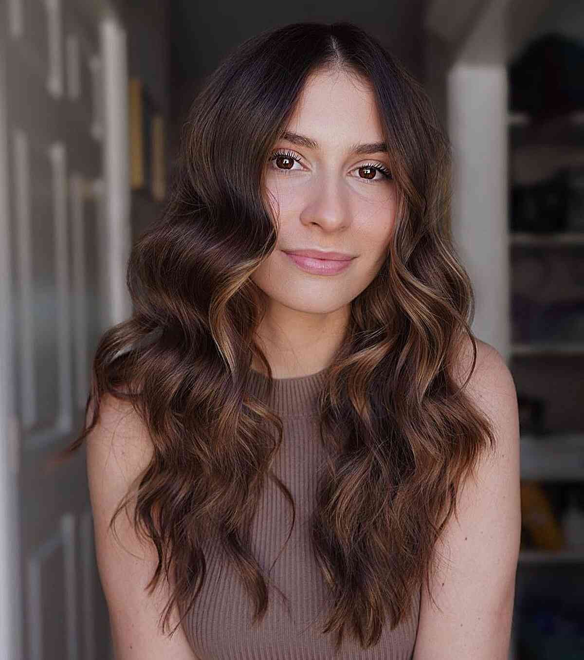 Layered Mid-Length Hair with Golden Natural Balayage