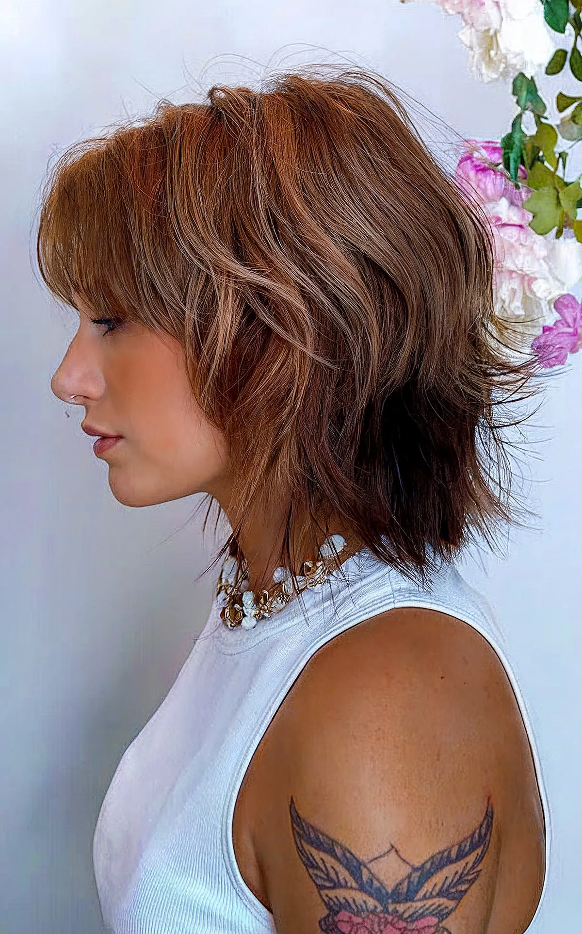 Layered bob with bangs for dense hair