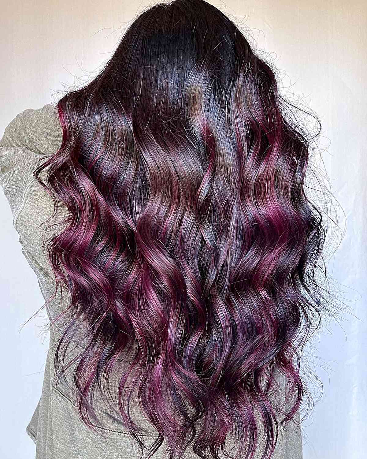 Layered Waves with Deep Purple Burgundy Highlights for Long, Dark Hair