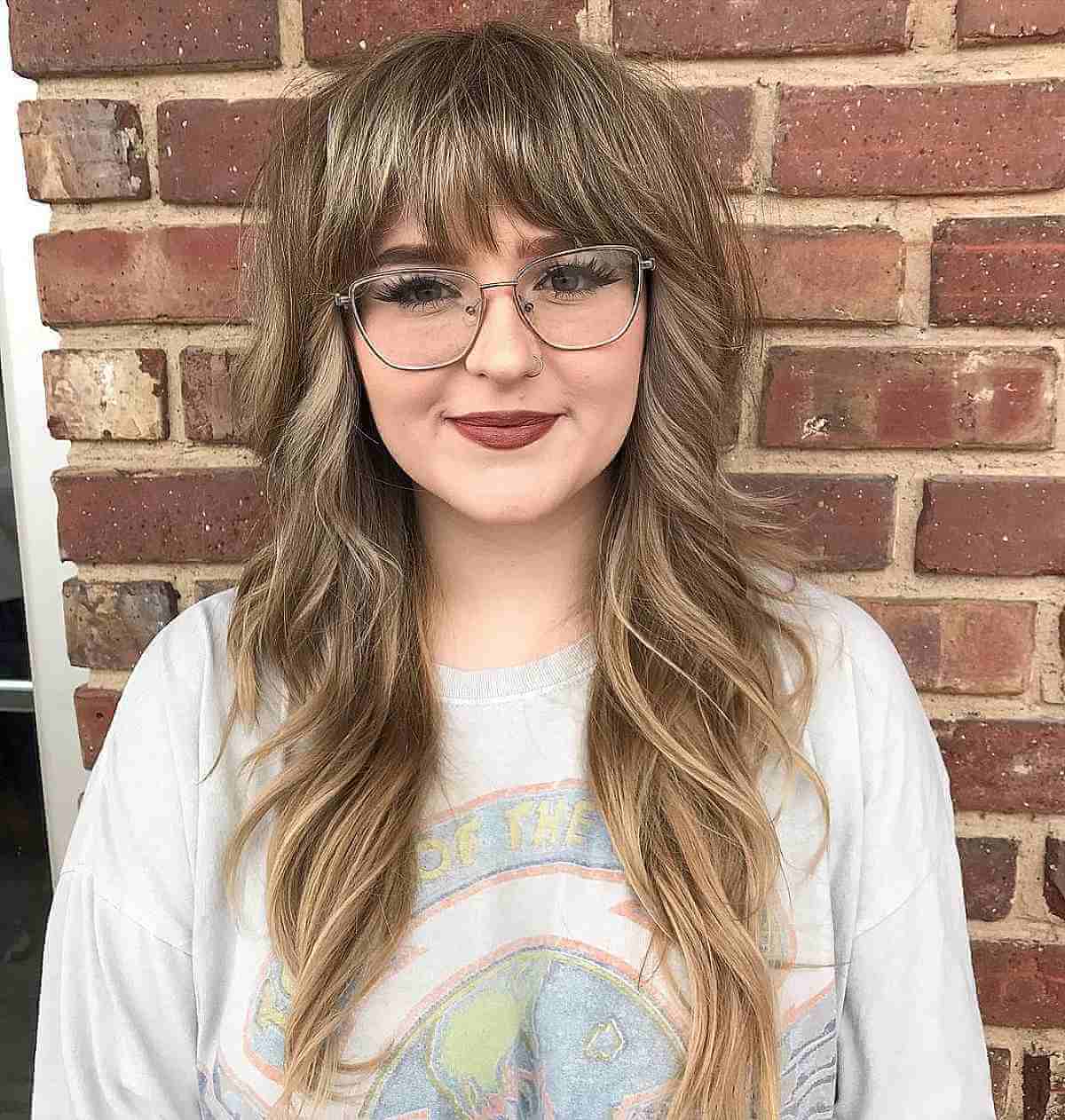 Lengthy Wispy Shag with Bold Bangs for Round Face Shapes