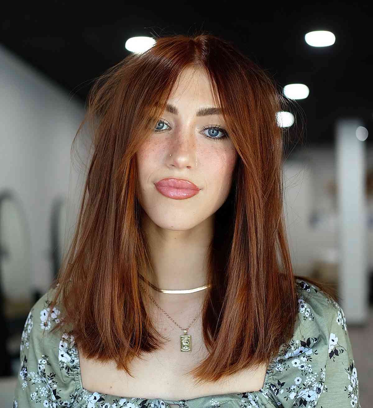 lengthy straight bob with a center part