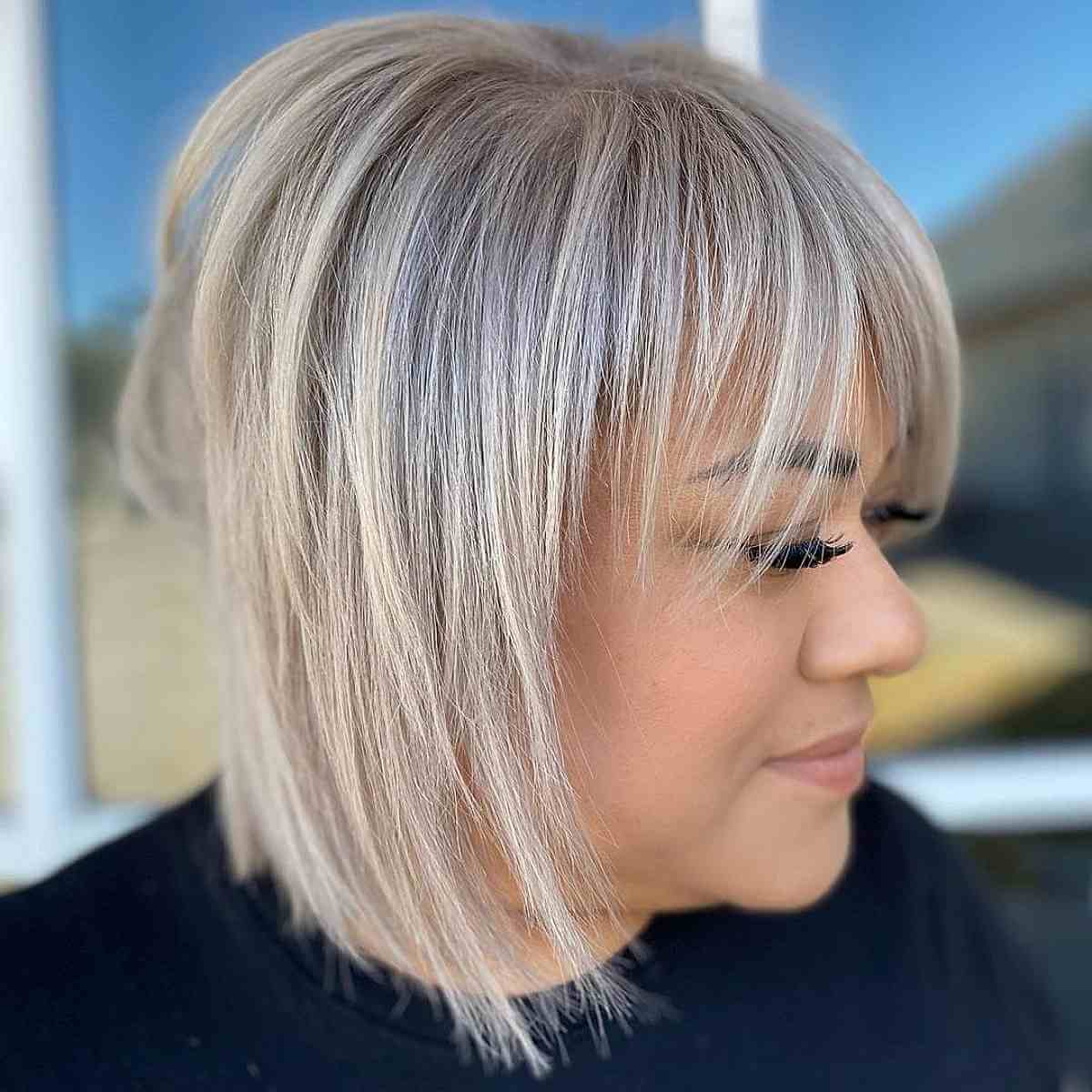 Light and Airy Blonde Hair with Soft Bangs