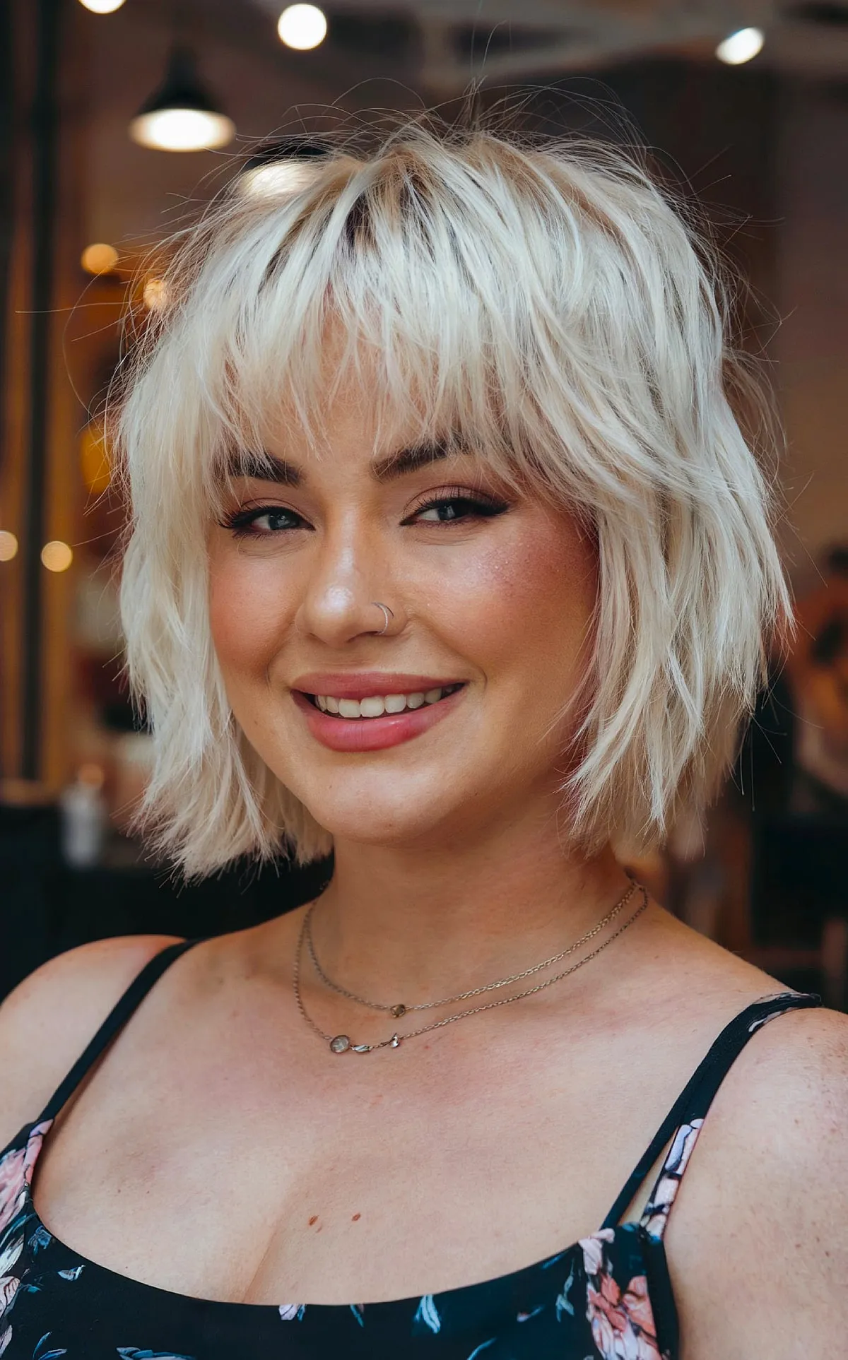 Light Beachy Blonde Short Bob with Subtle Bangs for rounded faces