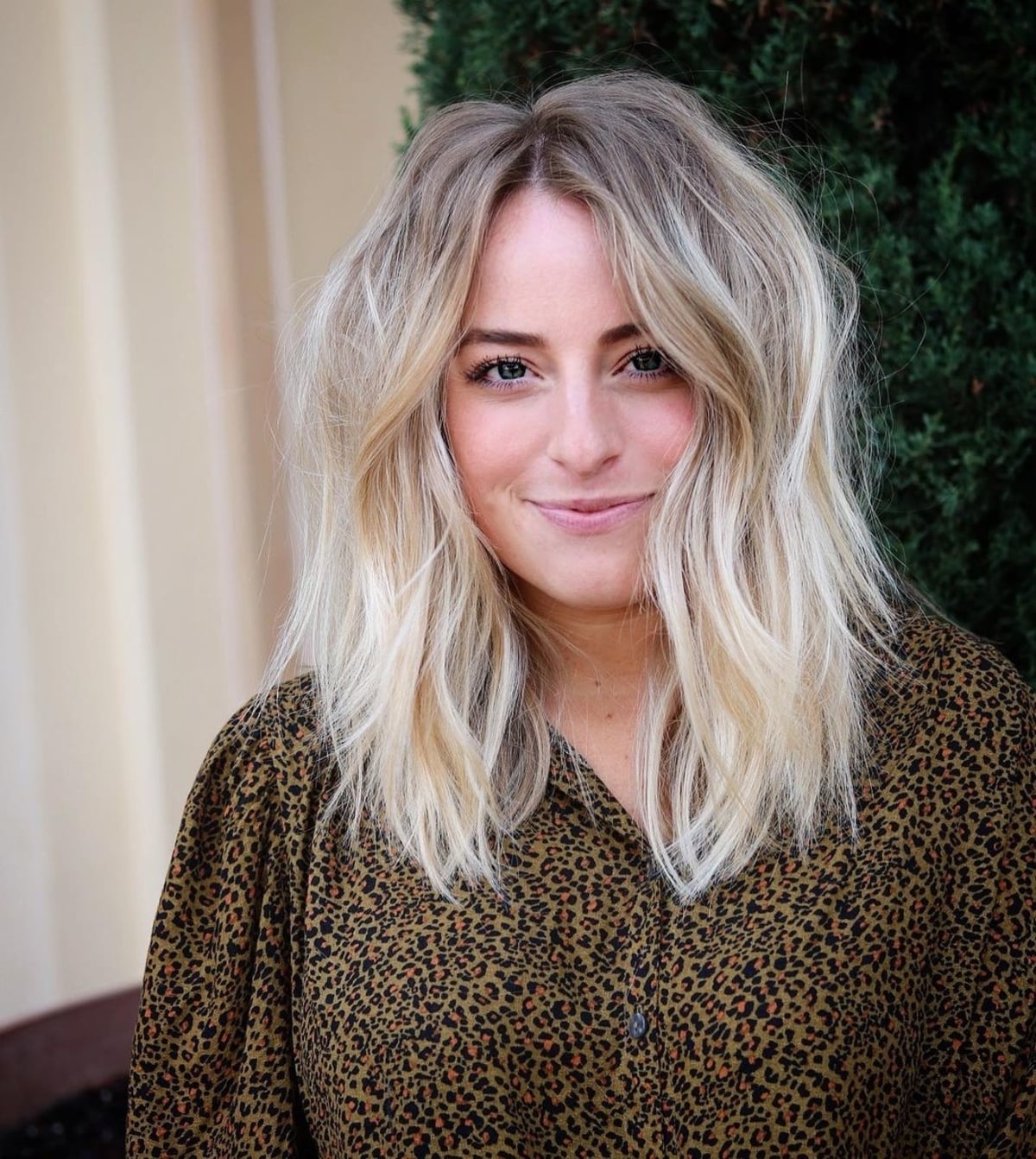 Light Blonde Shag with Face-Framing Layers for Shoulder-Length Hair