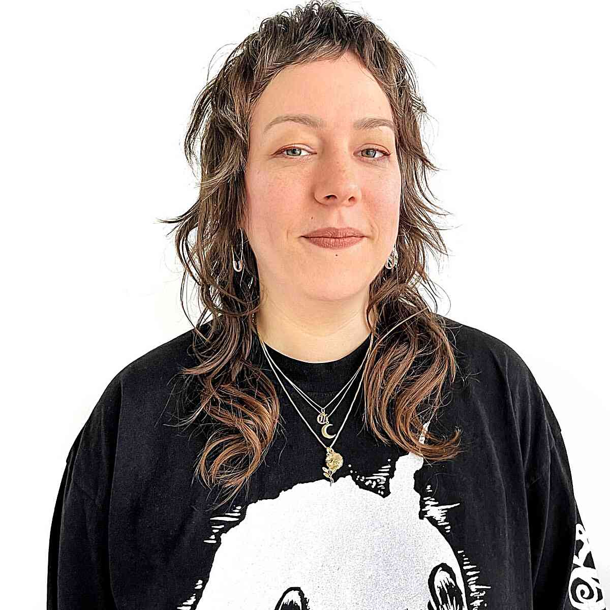 Chest-Length Light Shag with Flicked Layers for 40-Year-Old Ladies with Long Faces