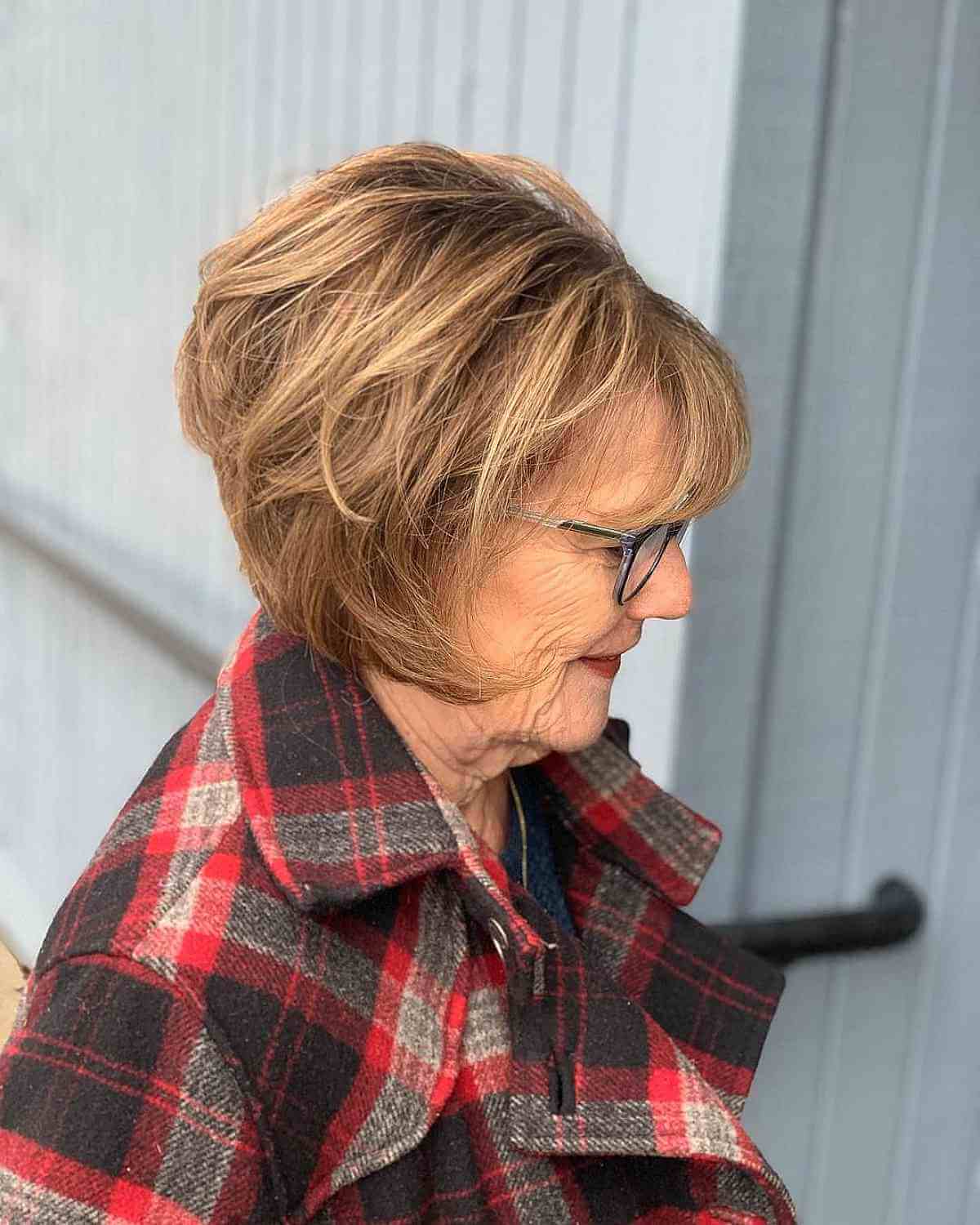 Lightly Layered Wedge Bob with Soft Bangs for a Lady in her 70s