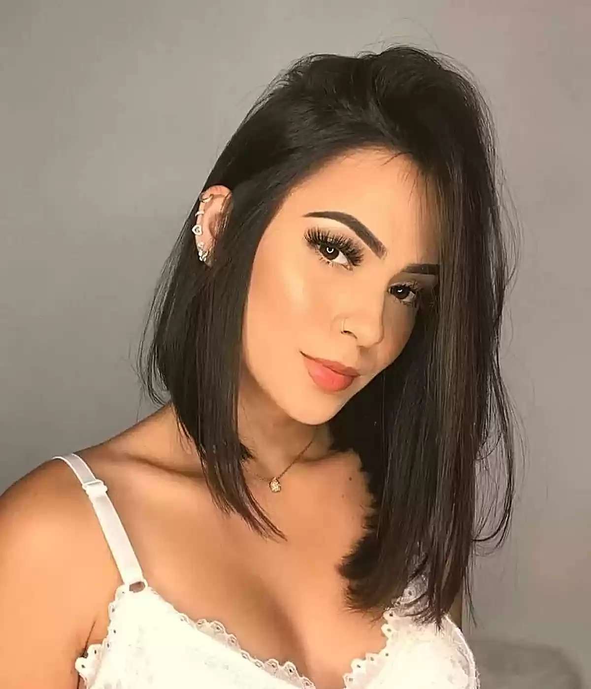 Long Graduated Bob with a Side-Swept Style and Angled Cut