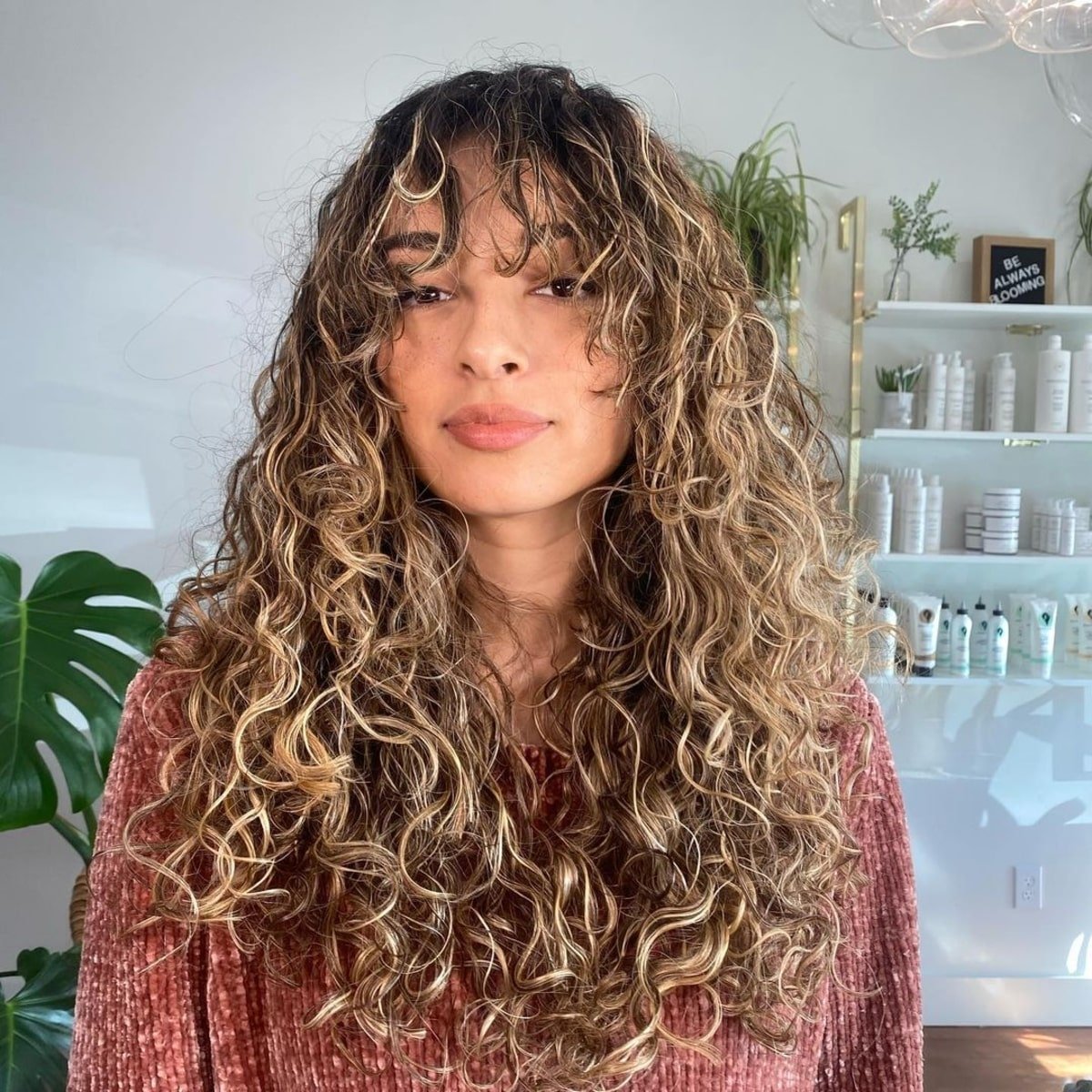 Long Curly Hair Featuring Extended Bangs