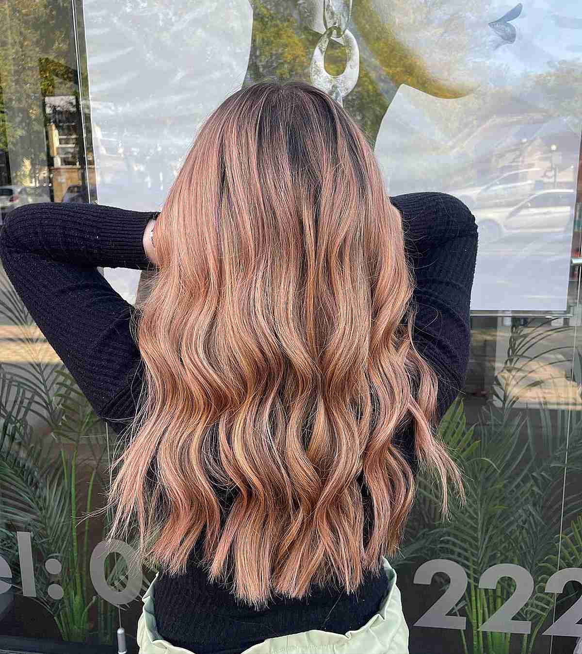 Long Hair with Dark Roots and Soft Rose Gold Balayage Tint