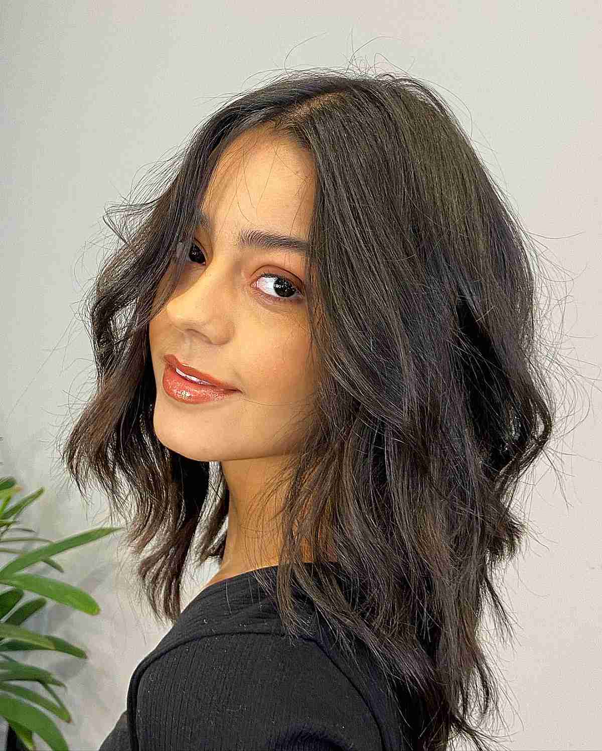 Long Razored Bob with Waves Featuring a Middle Part for Fine Hair