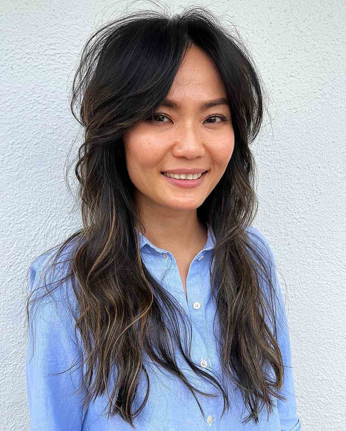 Long Shag with Crown Layers and Face-Framing Curtain Bangs
