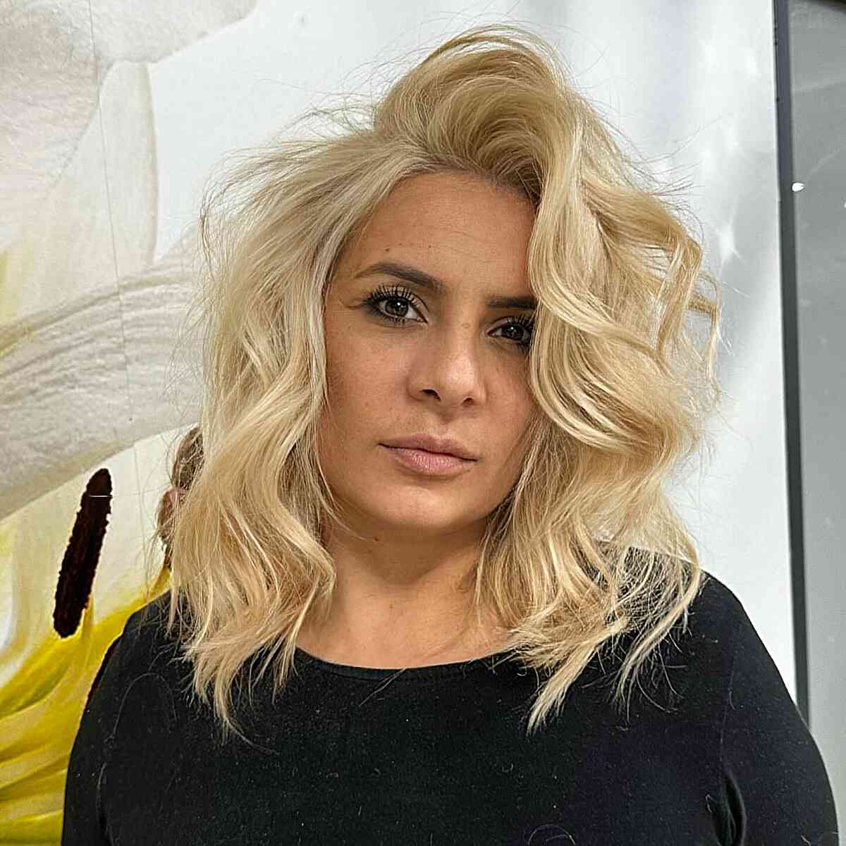 Luminous Golden Blonde Choppy Shoulder-Length Hair