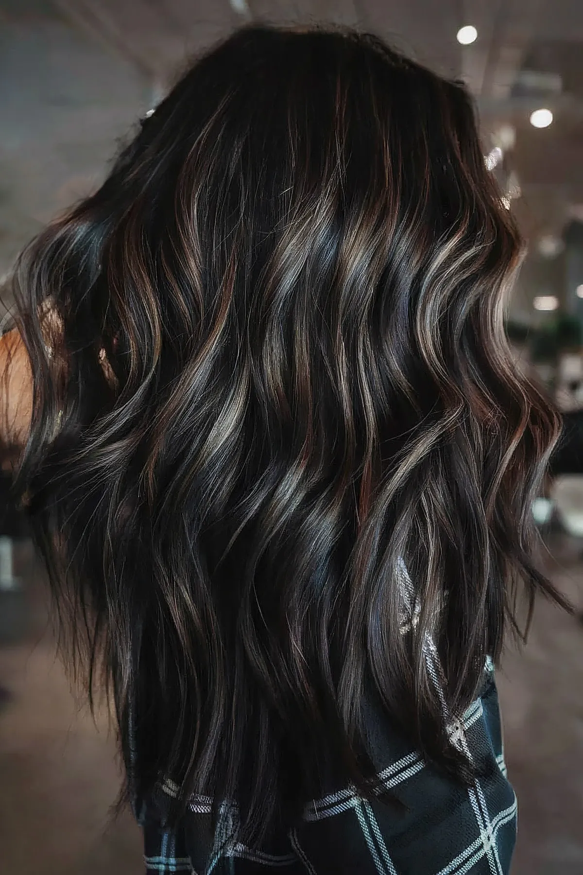 Luscious Black Tresses with Delicate Brunette Highlights