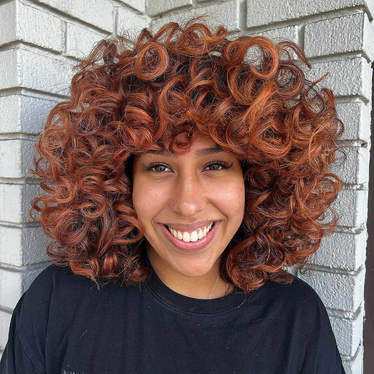 Lush Copper Rezo Cut Curls with Bangs