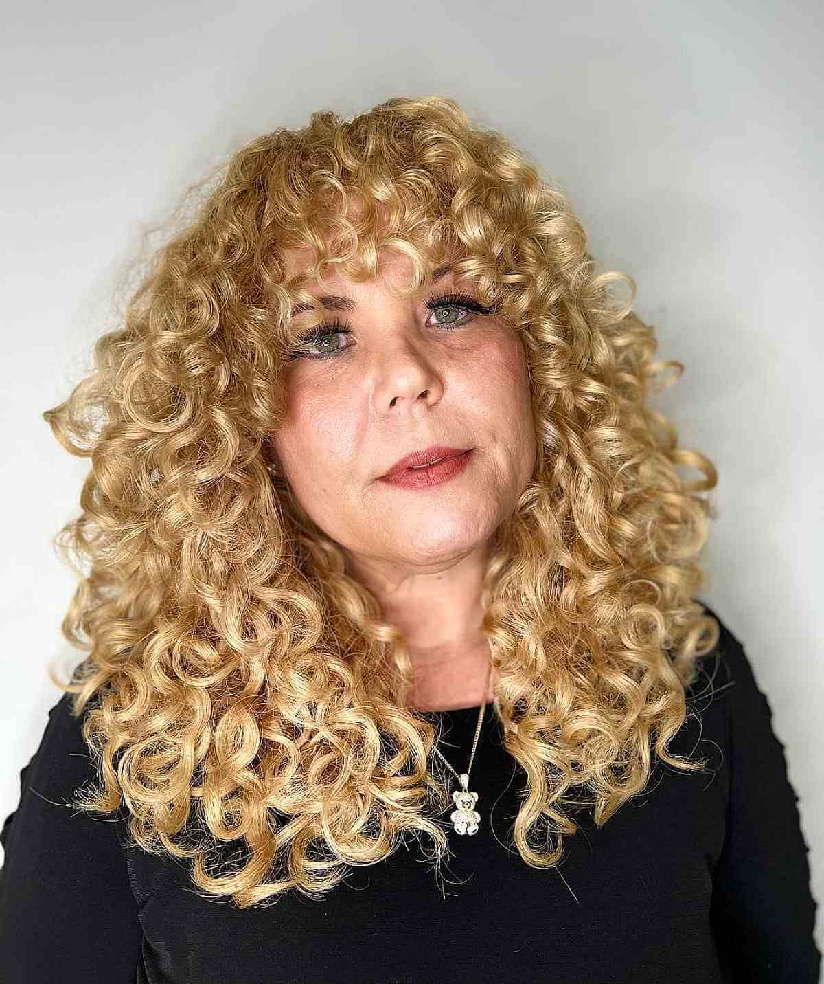 Mid-Length Thick Blonde Curls for Women Over Fifty