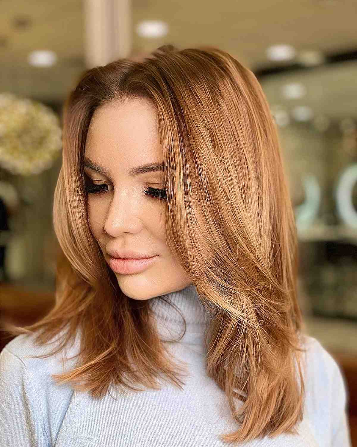 Luxurious blowout for medium-length layers