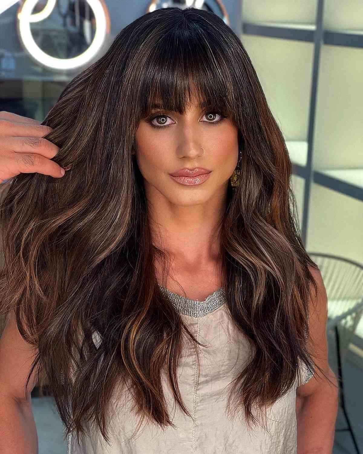 Long Luxurious Brunette Hair with Bangs and Layers