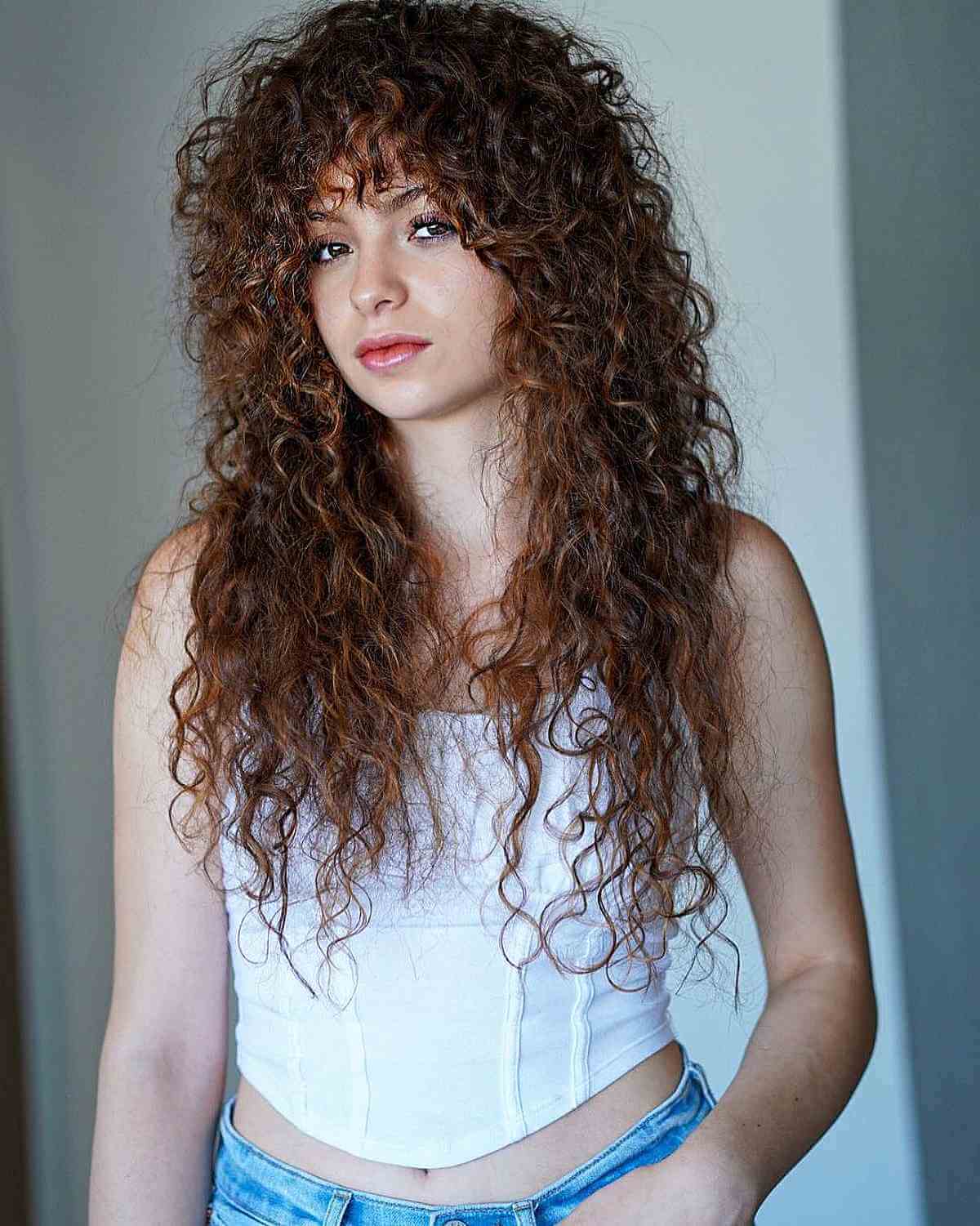 Luxurious Full Curls with a Curly Fringe for Long Hair