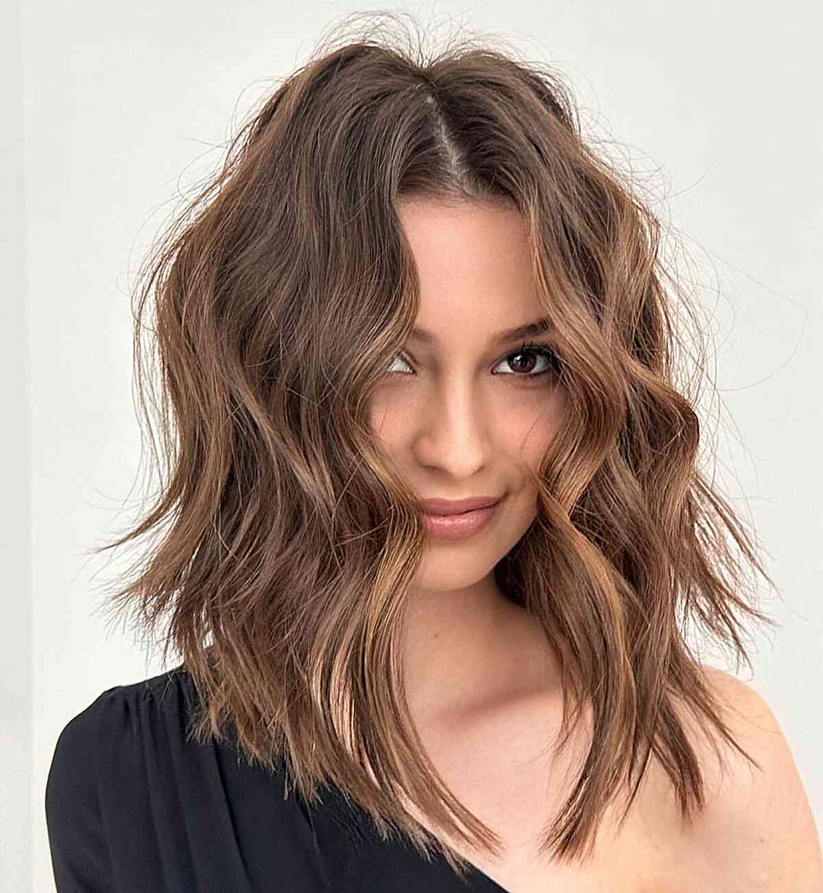 Collarbone-Length Medium Brown Center-Parted Hairdo with waves