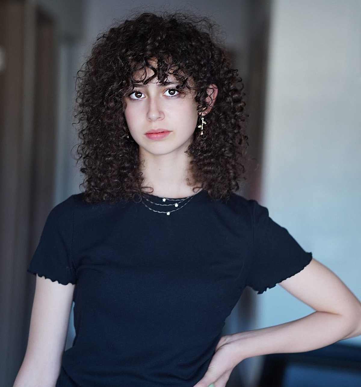 Medium-Length Brunette Ringlets with Fringes