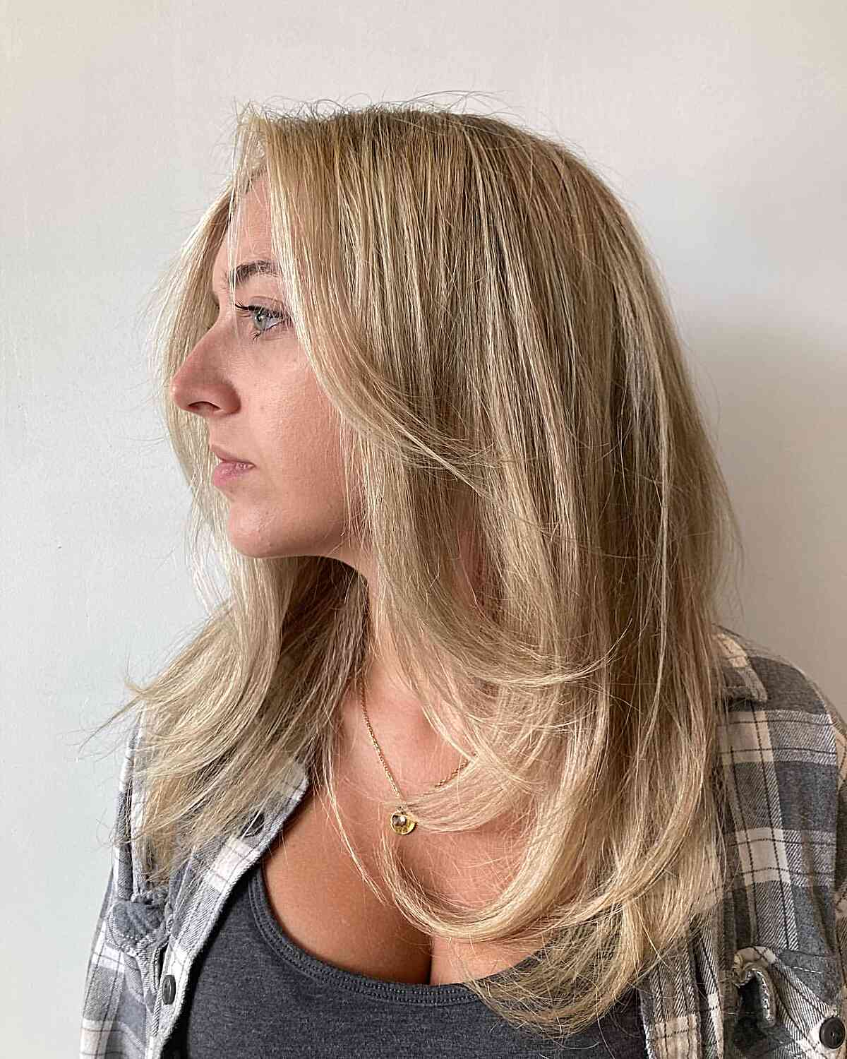 Medium Blonde Hair with Bold Layering