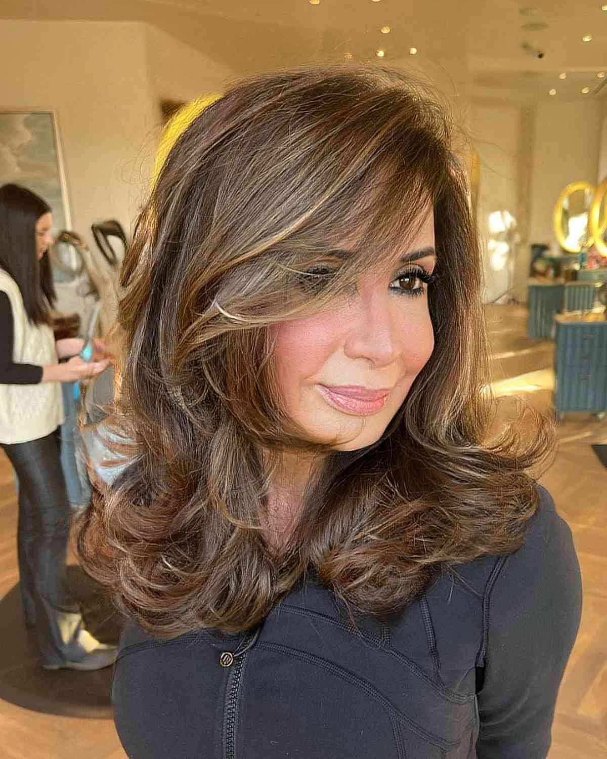 Medium-Length Layered Haircut with Side Bangs