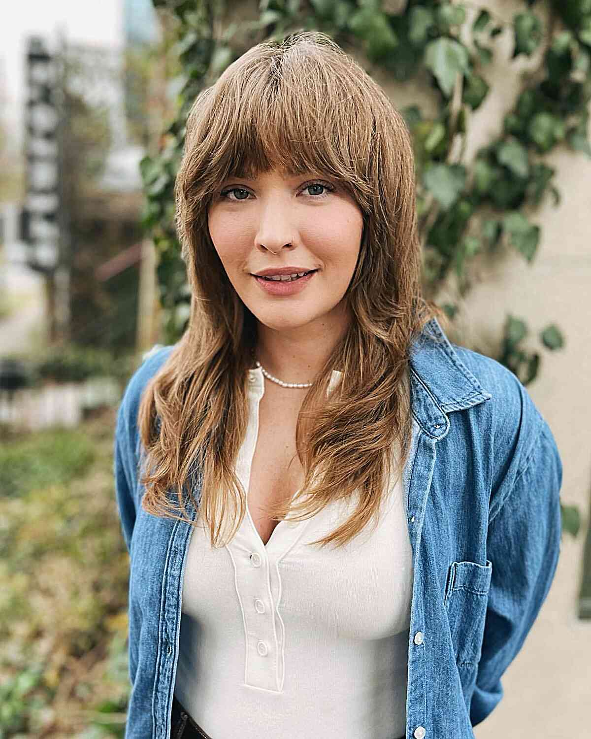 Medium-Length Light Brown Shag with Bold Fringe for women embracing a retro vibe
