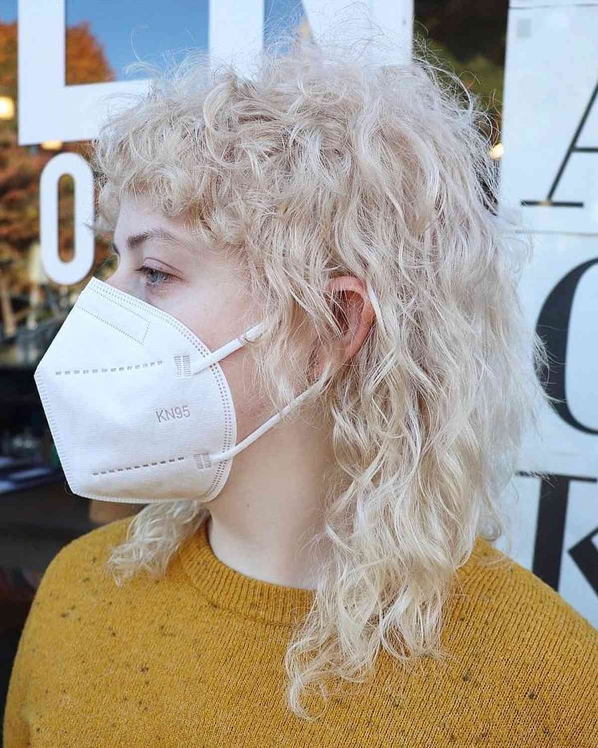 Medium-Length Wolf Cut Mullet with Soft Curls