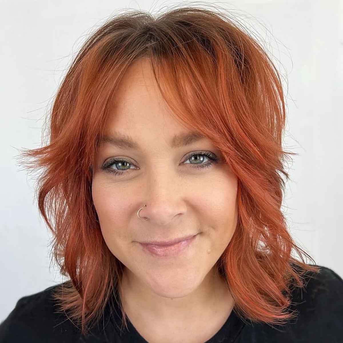 Medium-Length Shag with Curtain Bangs