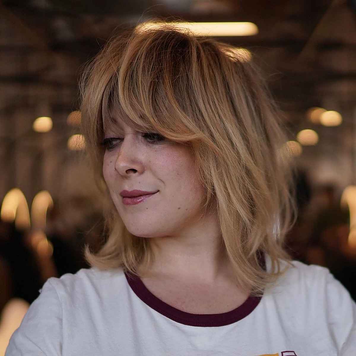 Medium-Length Shagged Bob with Bold Bangs