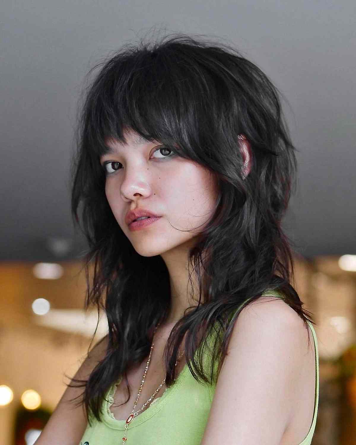 Medium-Length Shaggy Wolf Cut with Bangs