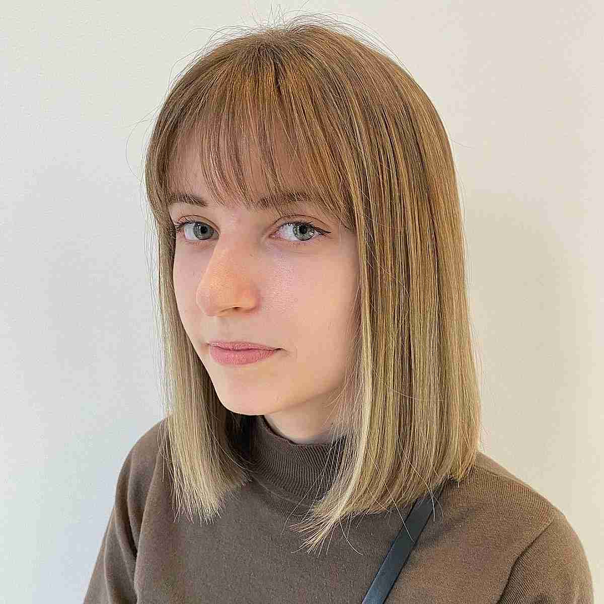 Straight Medium-Length Sliced Bob with Light Bangs