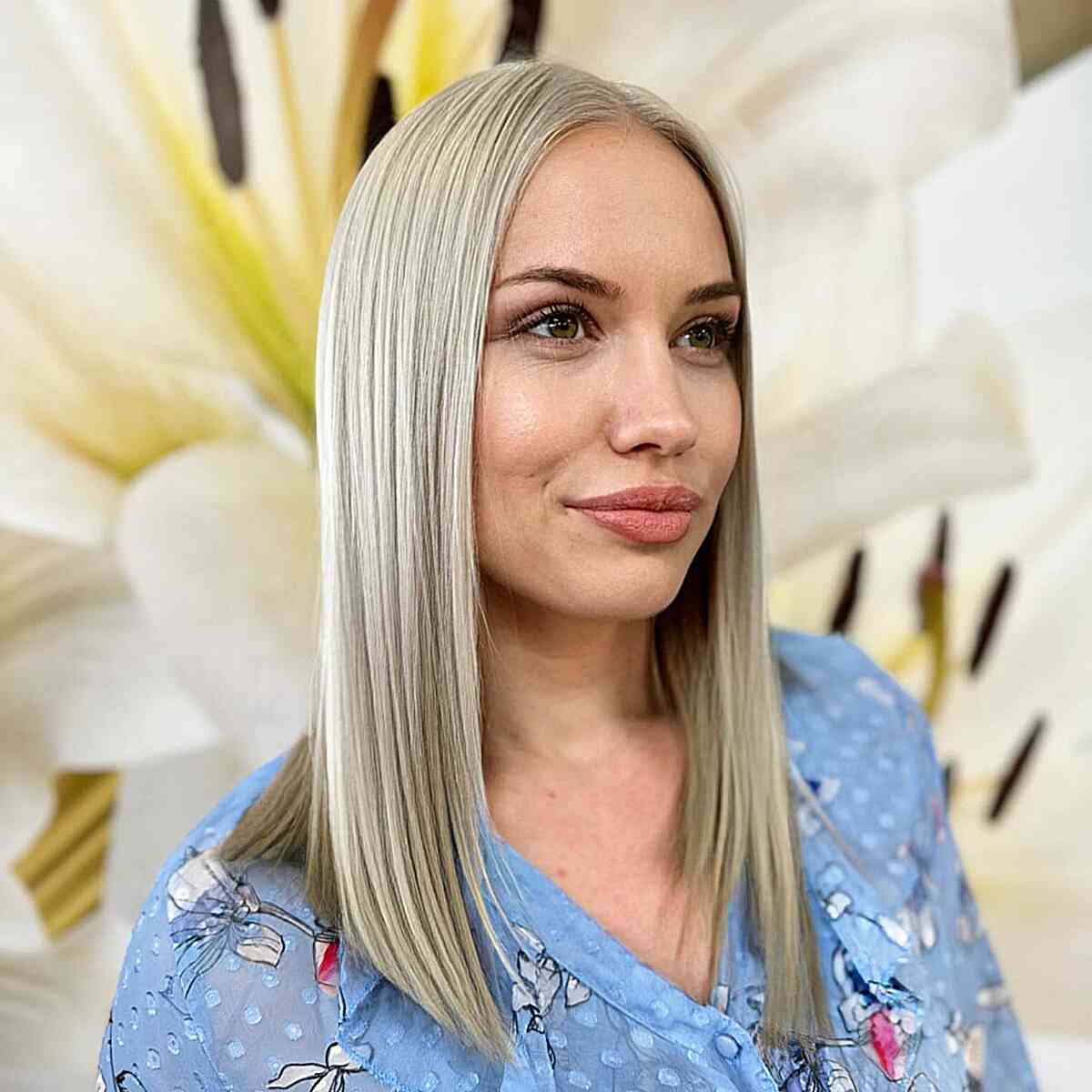 Medium-Length Straight Haircut Featuring Blunt Ends