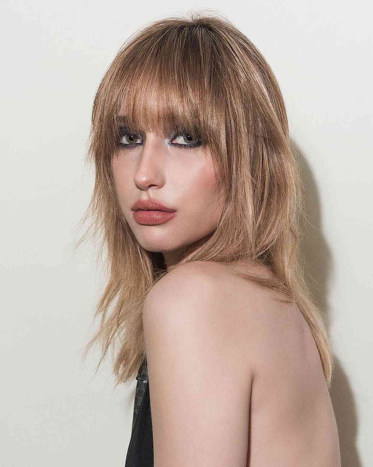 Medium Shag with Long Bangs from the 80s Era
