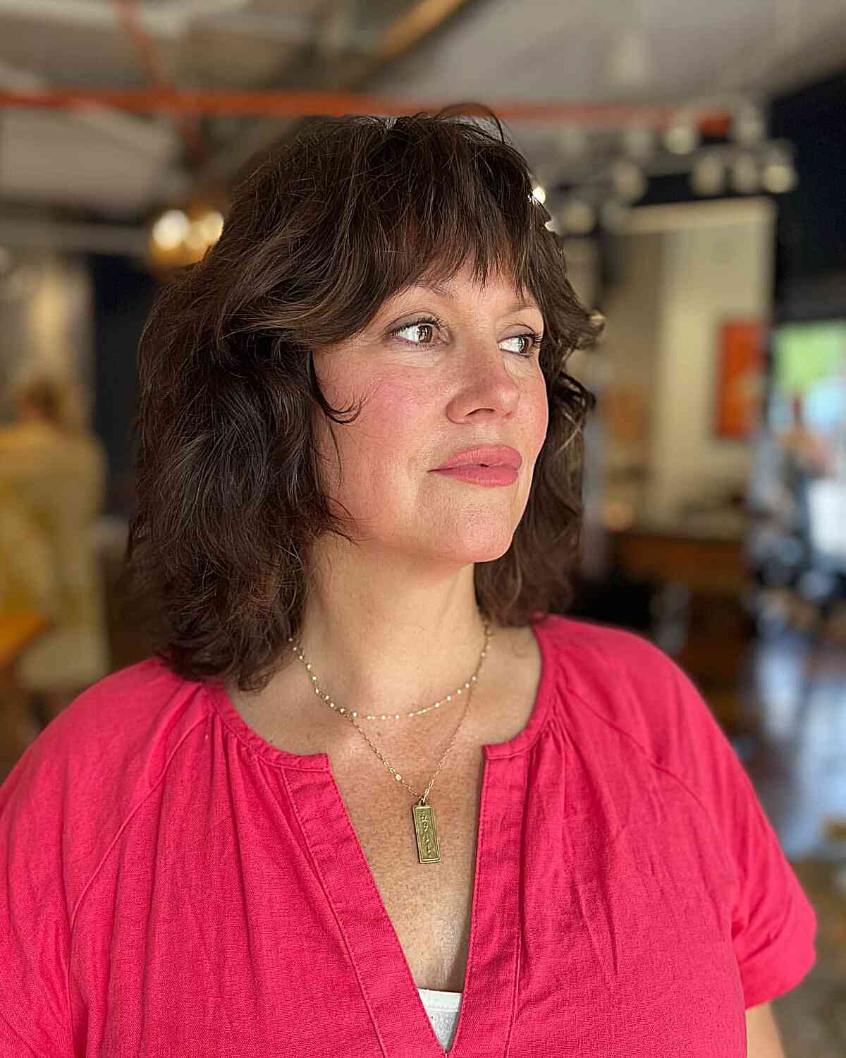 Medium Shaggy Layers with Gentle Waves on Older Women Over 40