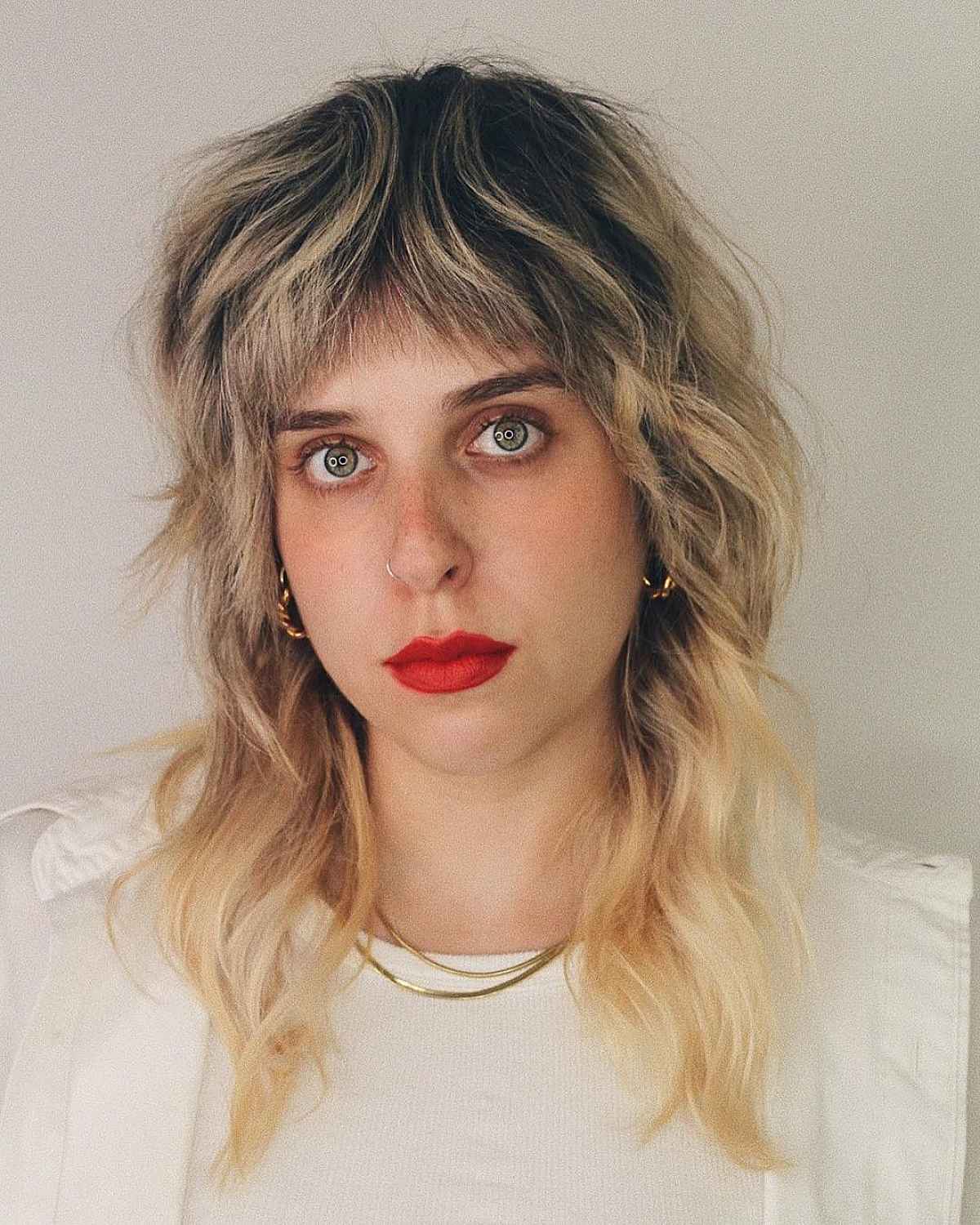 Medium Shaggy Mullet with Shorter Layers and Bangs